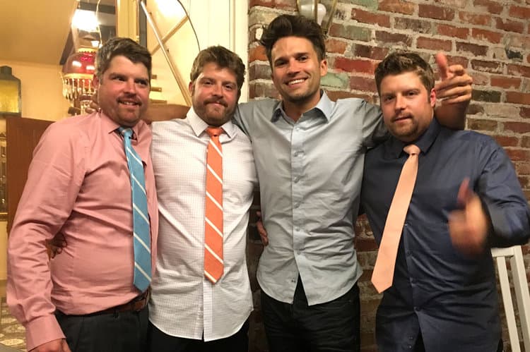 Tom Schwartz with triplet brothers William, Robert and Brandon