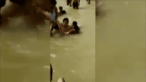 Ayodhya A Man Kisses Wife While Bathing in River, Got Beaten By Angry Crowd