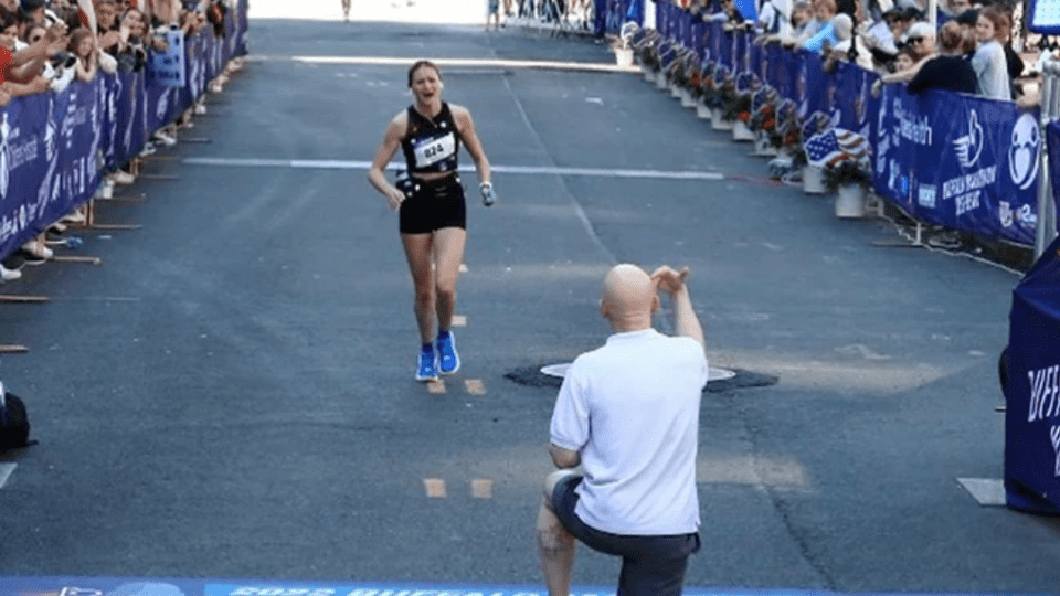 WATCH_ Man Stuns Girlfriend With A Shocking Surprise At The Finish Line Of Marathon In US_20220627_170838_0004