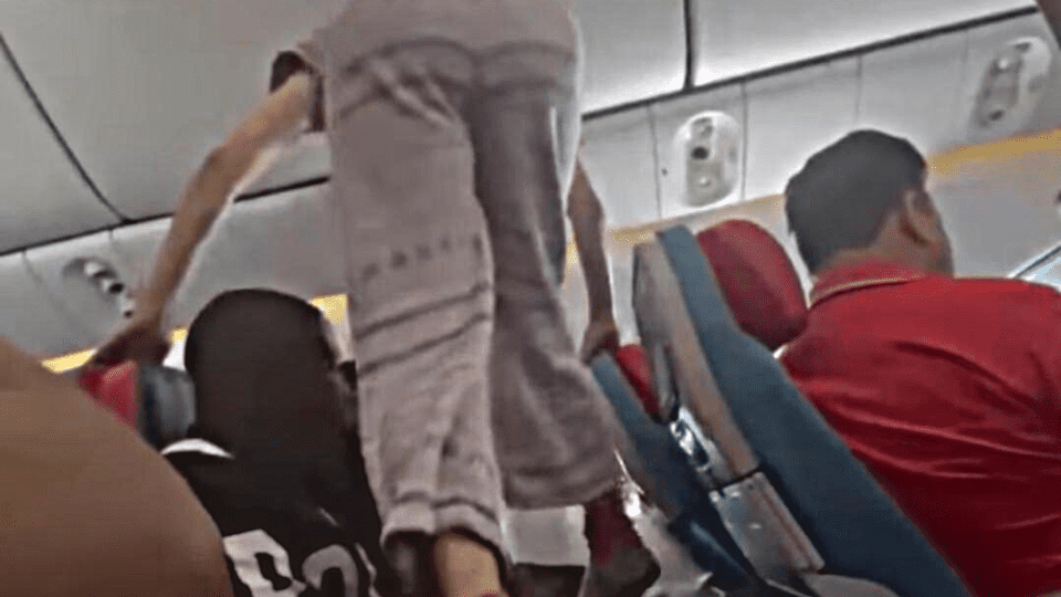 Woman Hops Over Passengers To Get To Her Window Seat On Plane