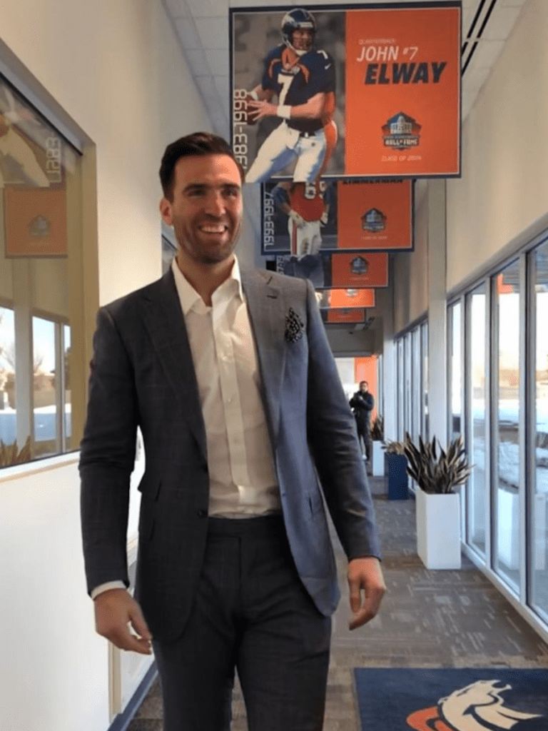 Joe Flacco is a suit at Denver