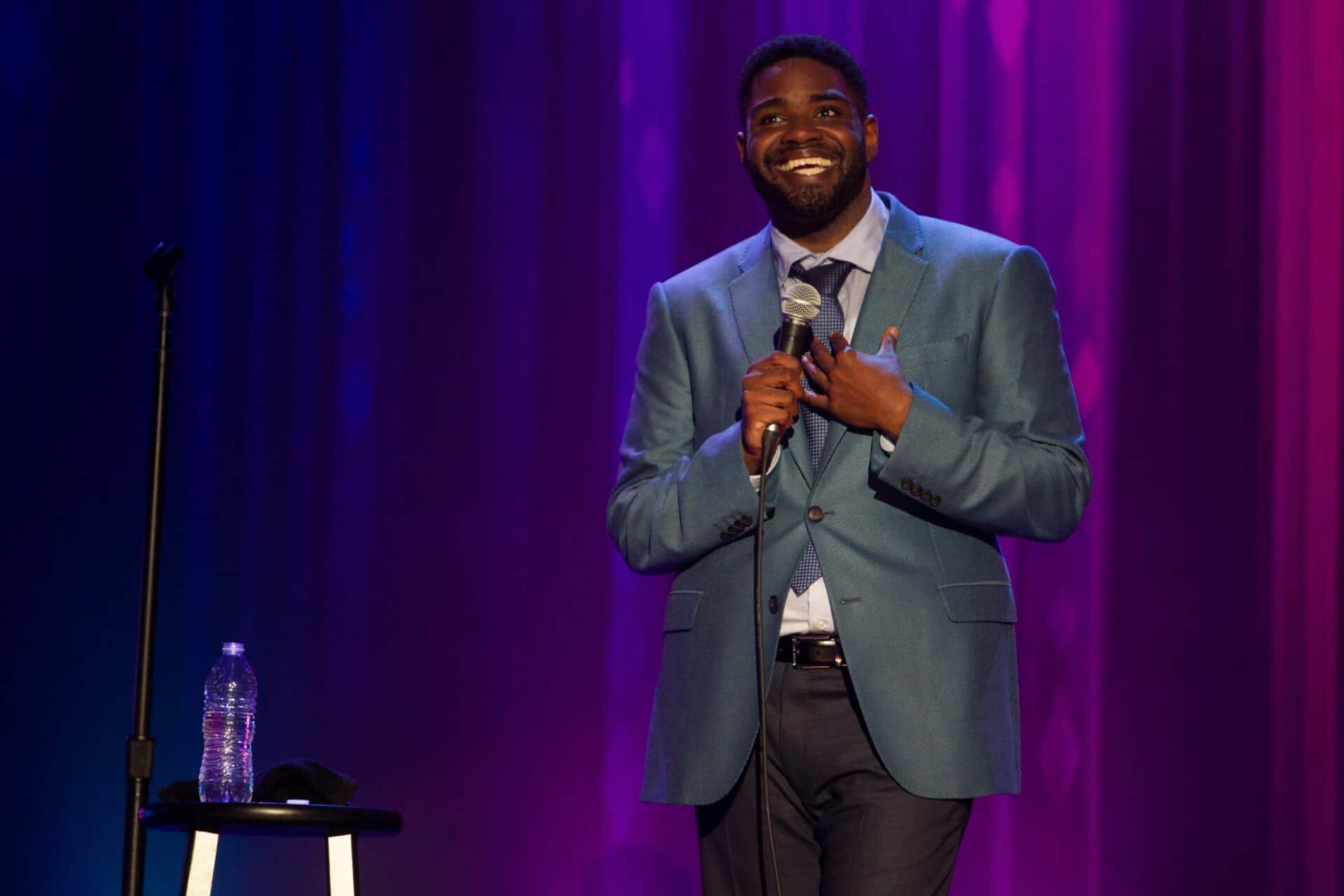 Ron Funches doing a stand-up comedy performance