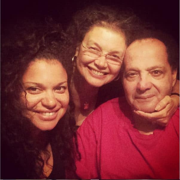 Michelle Buteau with her mother and father