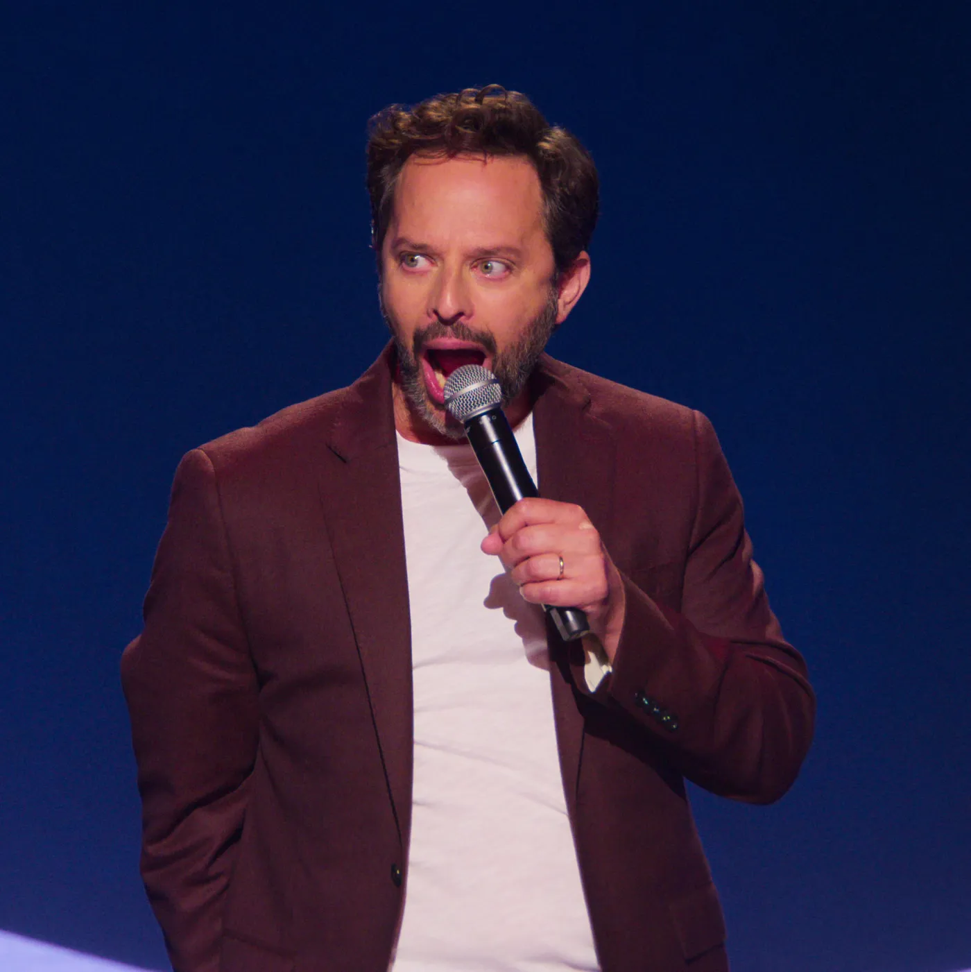 Nick Kroll doing a stand-up comedy performance