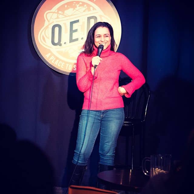 Sarah Cooper doing a stand-up comedy performance