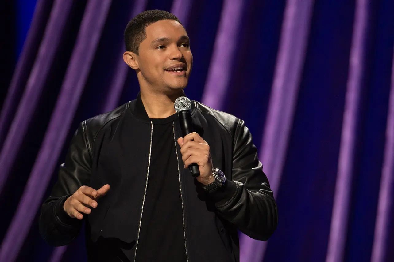 Trevor Noah doing a stand-up comedy performance